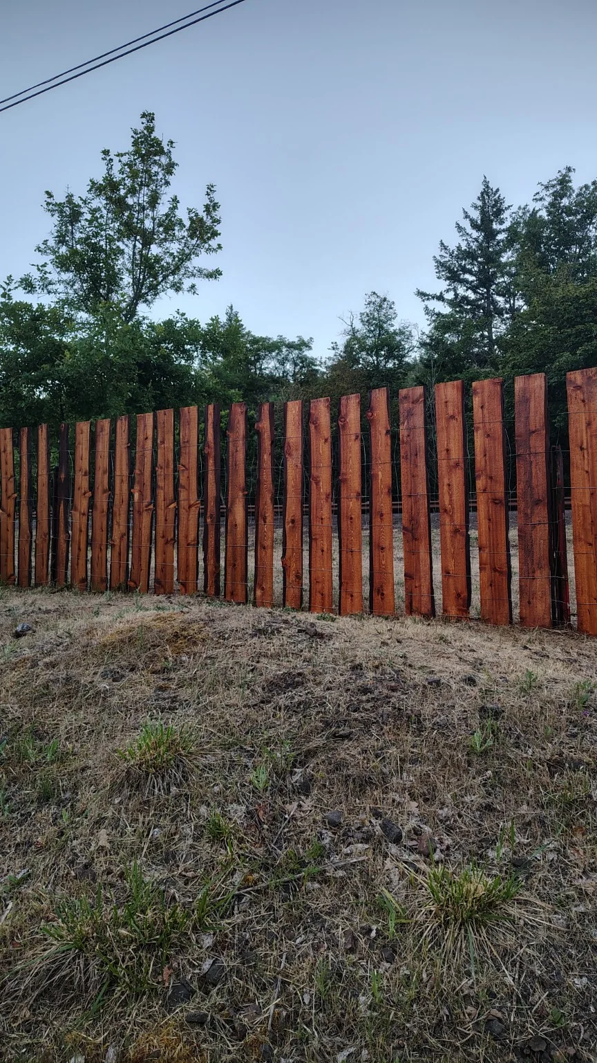 Farm fence and property at Rogue Rapid Farms